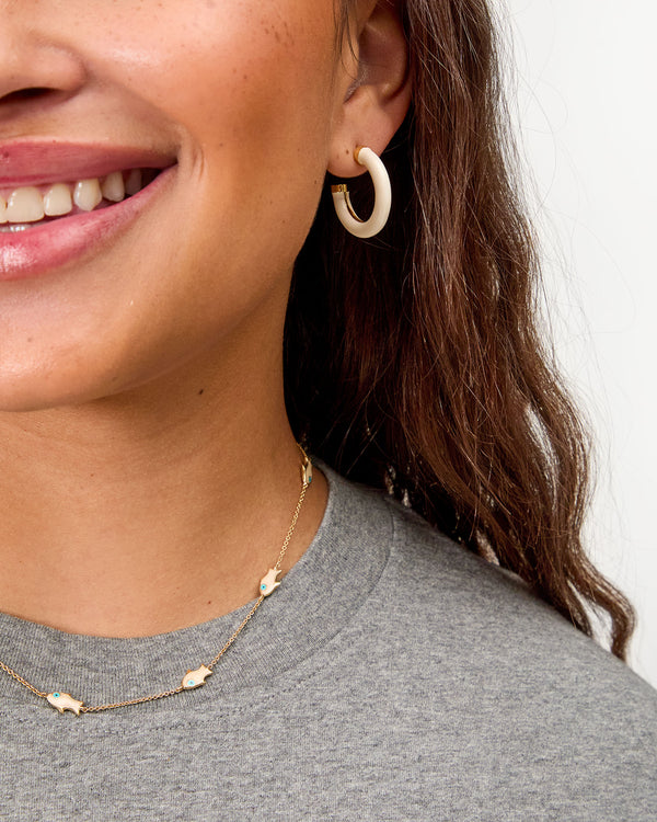 Le Tube Hoop Earrings on model