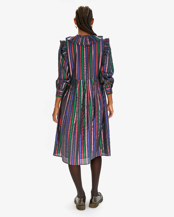 back view of Jordan in the Multi Stripe Léonie Dress