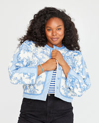 candice wearing the Lilou Jacket St. Calais Blue Toile with a stiped shirt and black pants