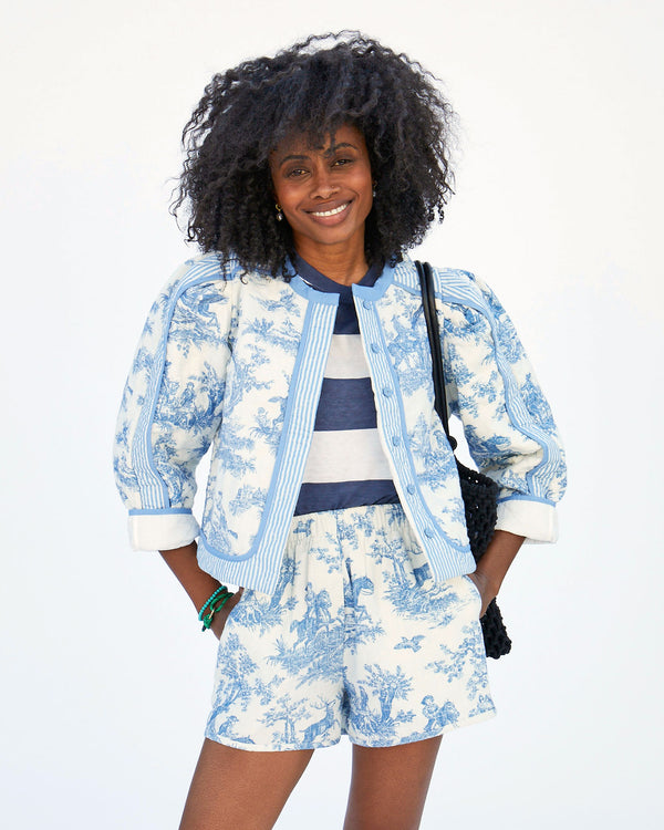 mecca wearing the Lilou Jacket St. Calais Blue Toile with her hands in her pockets