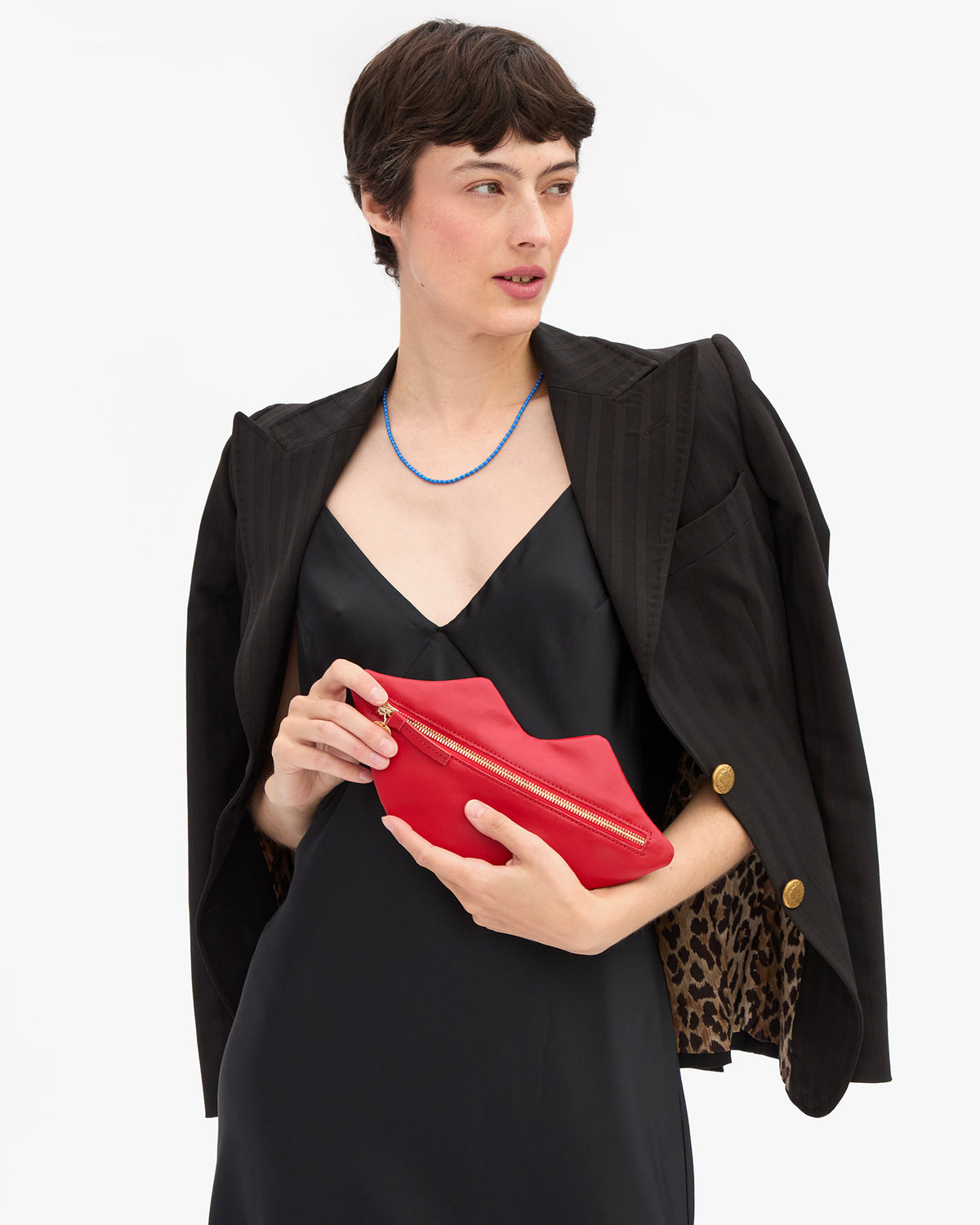 Lips Flat Clutch in Nike's hands