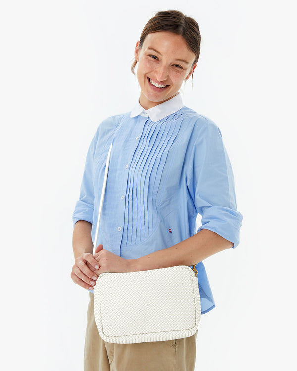 Zoe wearing the Brie diagonal woven Marisol crossbody