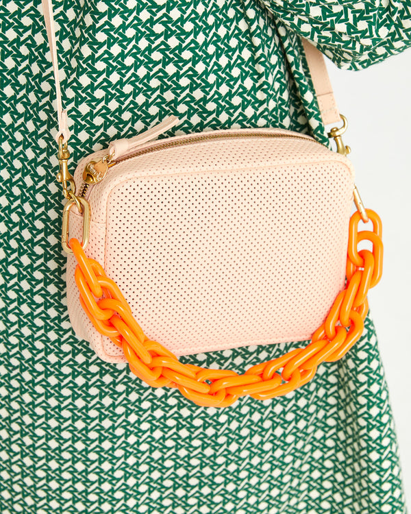 close up of the ballet perf midi sac with the neon orange resin shortie strap