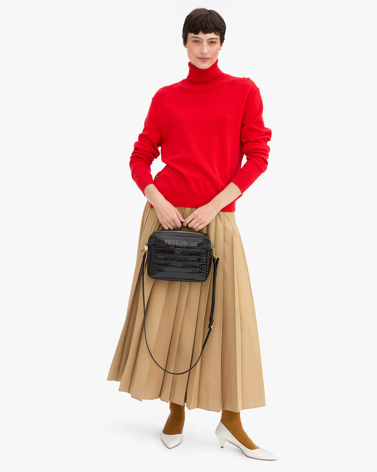Nike holding Mirabel top handle