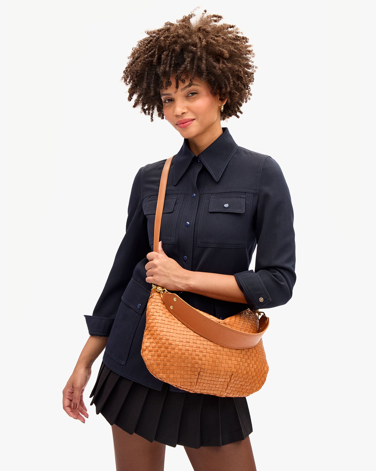 Lenny wearing Moyen Messenger as a crossbody