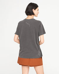 back view of athena in the  original tee faded black with bright poppy st calais blue maison bourgneuf