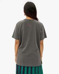 back view of Maly in the Faded Black Paris L.A. Original Tee
