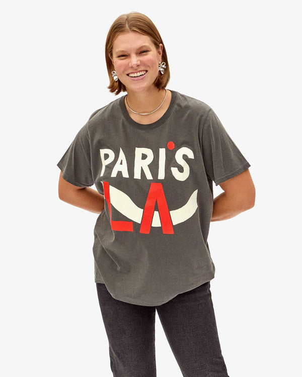 Sonnie wearing the Faded Black Paris L.A. Original Tee with black jeans
