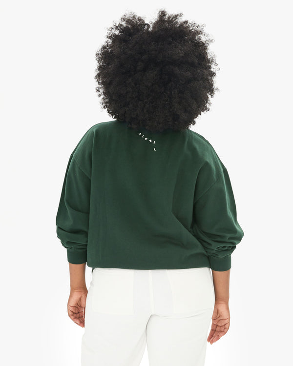 back view of Candice in the Forest Grand Oui Oversized Sweatshirt