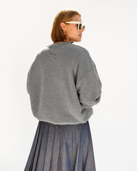 back view of Sonnie wearing the Grey L'Ennui Oversized Sweatshirt