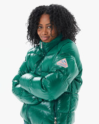 Mecca wearing the Vintage Mythic Puffer Coat in Forest Biome
