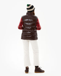 back view of Zoe wearing the John 2 Vest in Java with white jeans