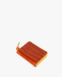 Cuoio Autumn Croco Petit ZIp Wallet showcasing the marigold zipper.
