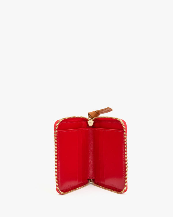 Red Interior of the Cuoio Petit Zip Wallet. 