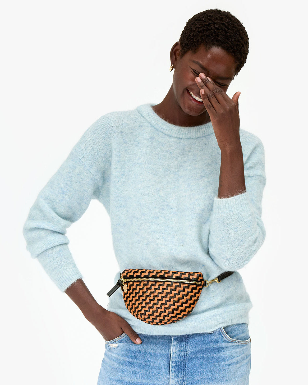 Mouna wears Petite Fanny as a waist bag