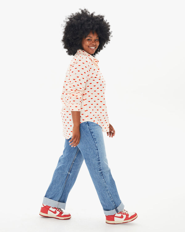 candice taking a step in jeans, sneakers and Blush w/ Lips Phoebe Blouse