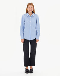 Aurelia with the Blue & Cream Stripe Phoebe Blouse worn untucked over black pants