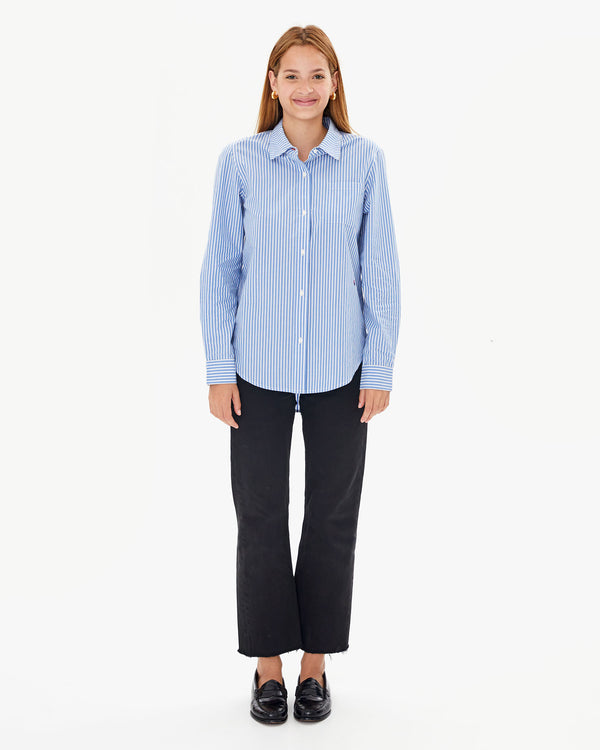 Aurelia with the Blue & Cream Stripe Phoebe Blouse worn untucked over black pants