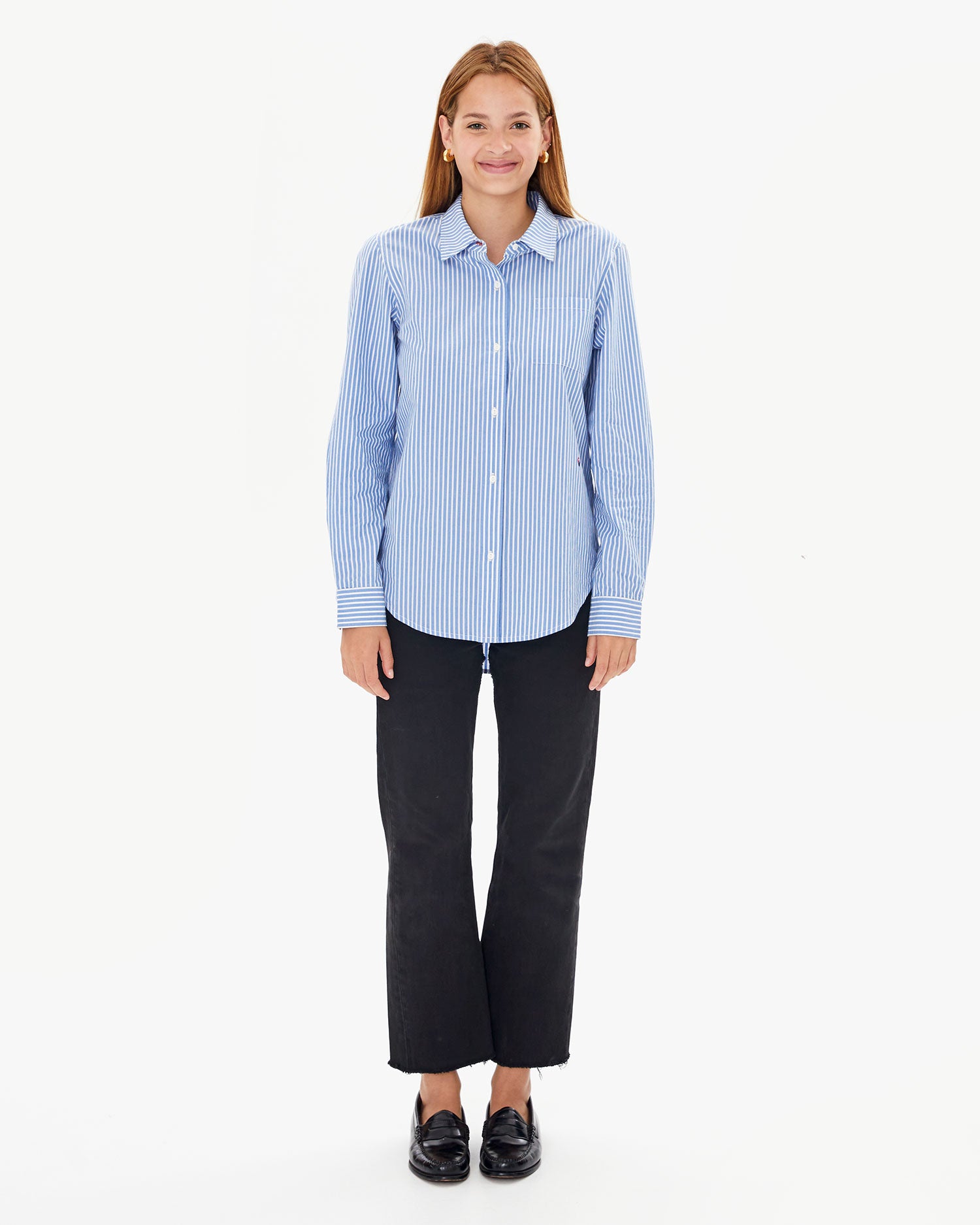 Aurelia with the Blue & Cream Stripe Phoebe Blouse worn untucked over black pants