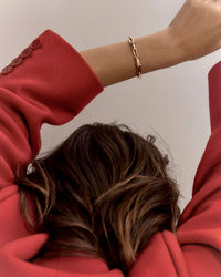 Model wearing the Rome Bold Link Chain Bracelet on her left wrist