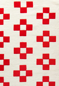 close up of the pattern on the Cream & Poppy Rug