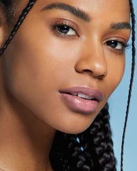 a second model wearing the Rel Beauty Lip Balm in Totally