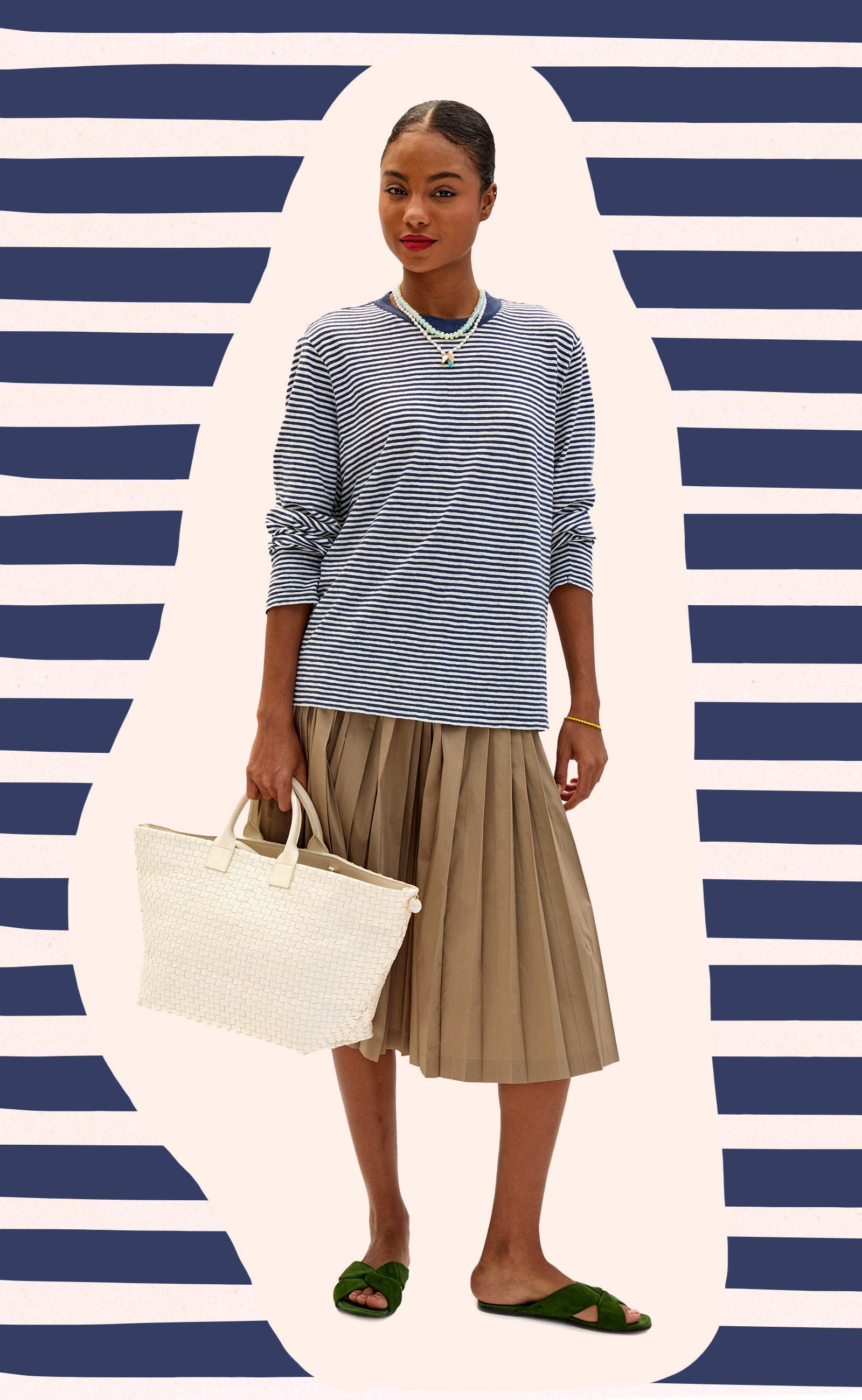 Model wearing the Navy and Cream Mini Stripe Long Sleeve Tee and carrying the Cream Bateau Tote.