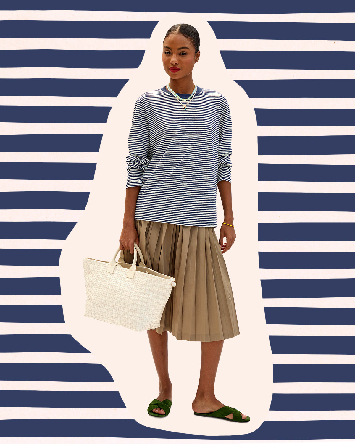 Model wearing the Navy and Cream Mini Stripe Long Sleeve Tee and carrying the Cream Bateau Tote.