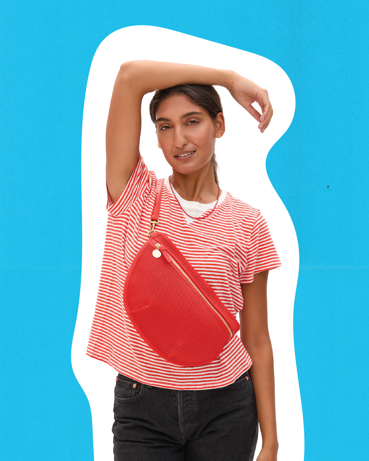 Model wearing the Bright Poppy/Cream Mini Stripe Classic Tee with Bright Poppy Diamond Perf Grande Fanny.
