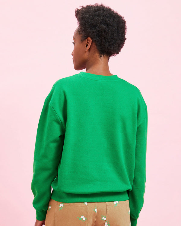 back view of the model wearing the Green w/ Black Bourgeoisie Sauvage Sweatshirt