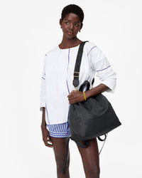 Sac Tout Backpack as a shoulder bag