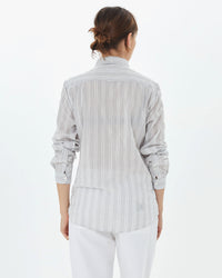 back view of zoe in the cream stripe Single Needle Shirt