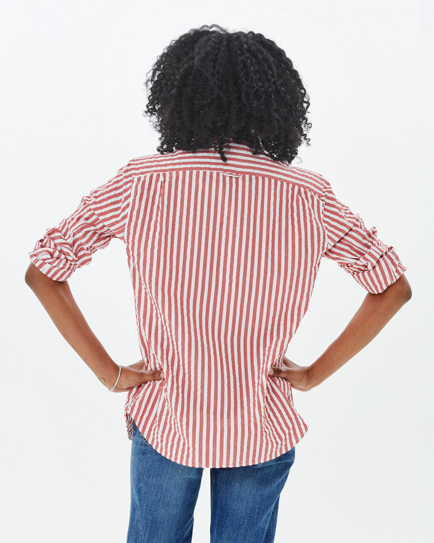 back view of mecca in the  Poppy & cream Stripe Single Needle Shirt