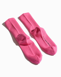 bottoms of the SOCKSSS Original Socks in Bubblegum