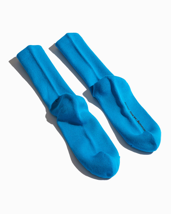 bottoms of the SOCKSSS Original Socks in Mega Blue