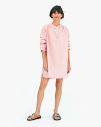 danica wearing the Flamingo & Cream Stripe St Martin Dress with tan sandals