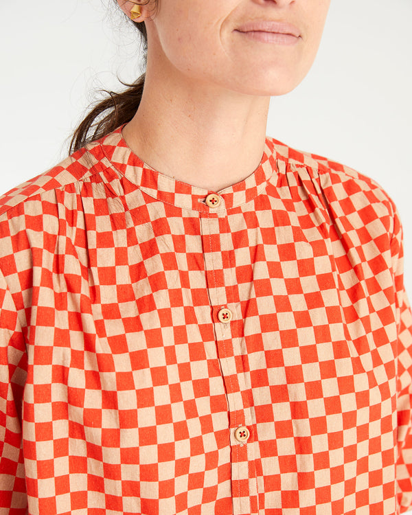 danica wearing the Poppy & Khaki Checker St. Martin Top. photo shows a detailed shot of the button placket