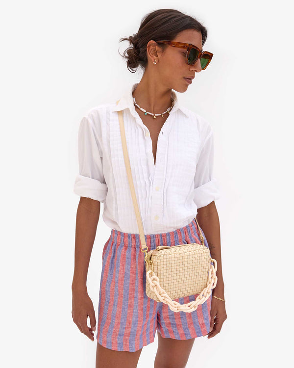 Hayley wearing the cream woven checker midi sac crossbody with the Cream Resin Shortie Strap