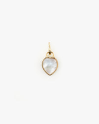 the mother of pearl side of the Emerald Stone Padlock Charm