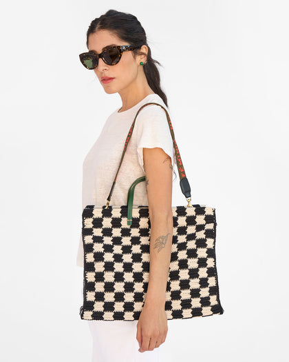 Gia wears the Black & Cream Crochet Checkers Summer Simple Tote on her shoulder