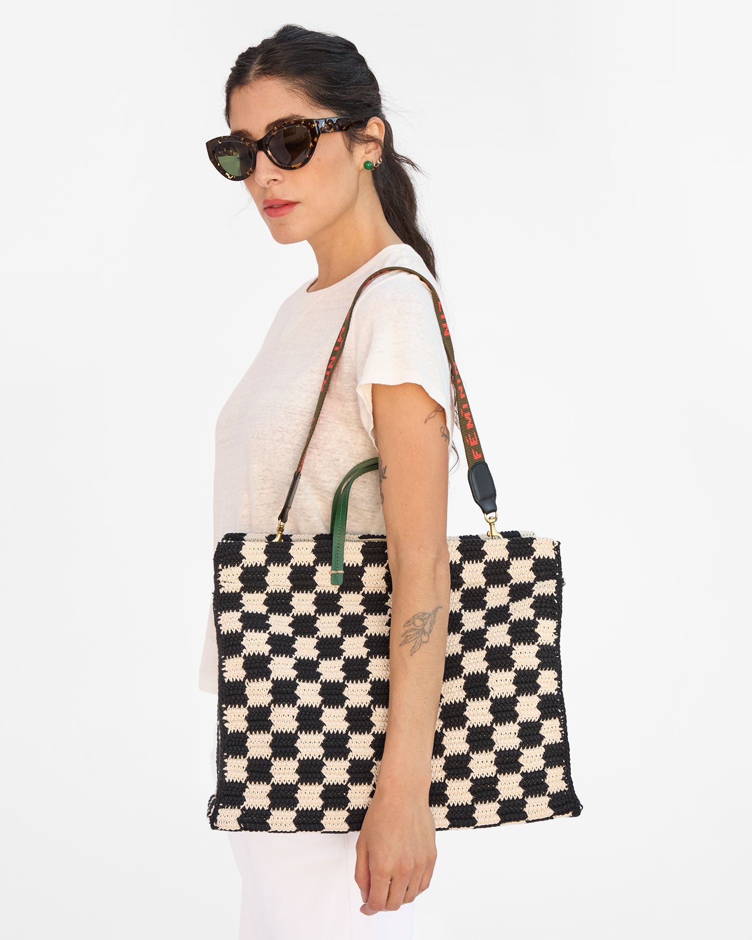 Gia wears the Black & Cream Crochet Checkers Summer Simple Tote on her shoulder