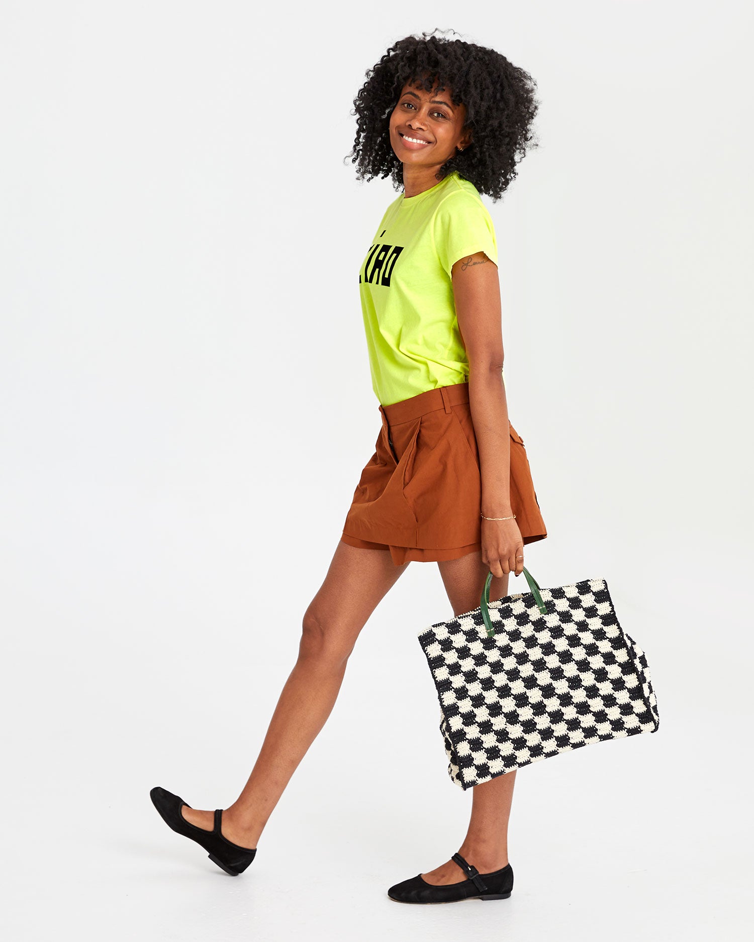 Mecca carrying the Black & Cream Crochet Checkers Summer Simple Tote