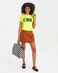 Mecca in a skort, a neon tee shirt and the Black & Cream Crochet Checkers Summer Simple Tote