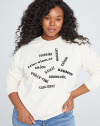 candice wearing the Sweatshirt in Cream with Valle de Loire with jeans