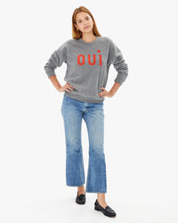 Aurelia wearing the Heather Grey Oui Sweatshirt with jeans and loafers