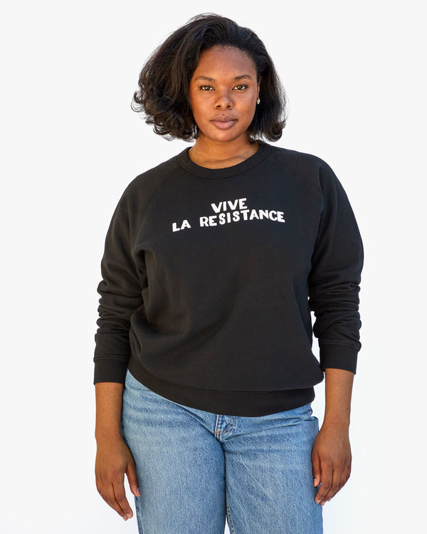 Candice wearing Vive La Resistance sweatshirt