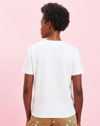 back view of the model wearing the Cream w/ Black Charmant Tee