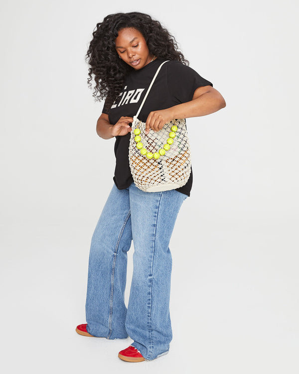 Candice wearing the Cream georgette with the Neon Yellow Tennis Ball Collar