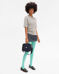 Angel holding Turnlock Louis