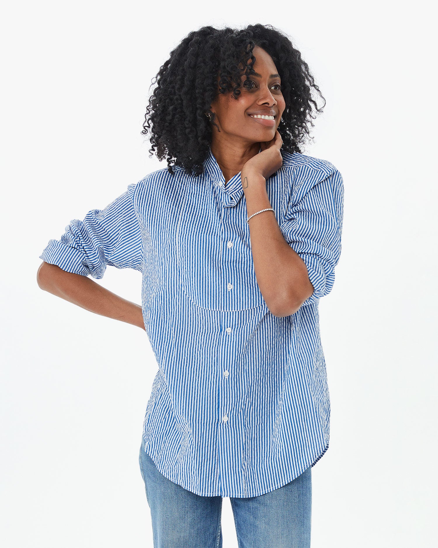 Mecca wearing the Steven Alan Tux Shirt In Blue and Cream Stripe with jeans